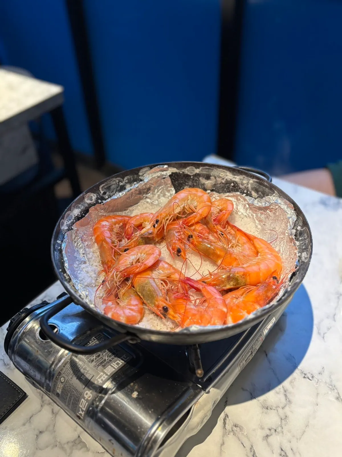 Close-up of golden-brown salt-grilled shrimp