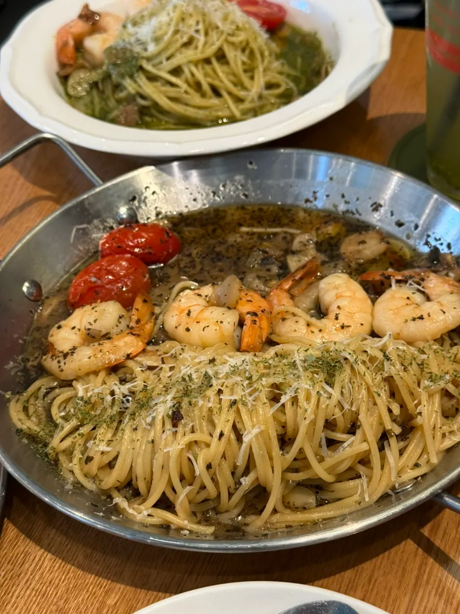Gambas oil pasta topped with shrimp