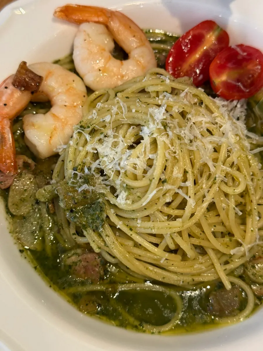 Plump shrimp on top of the basil pasta