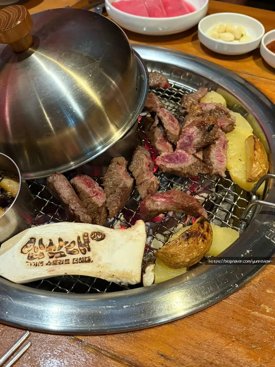 Staff grilling premium beef ribs