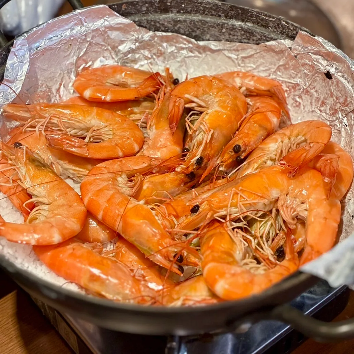Golden brown, perfectly grilled seasonal raw shrimp