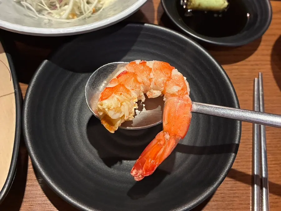 Grilled shrimp served with vinegar-chili sauce and soy sauce