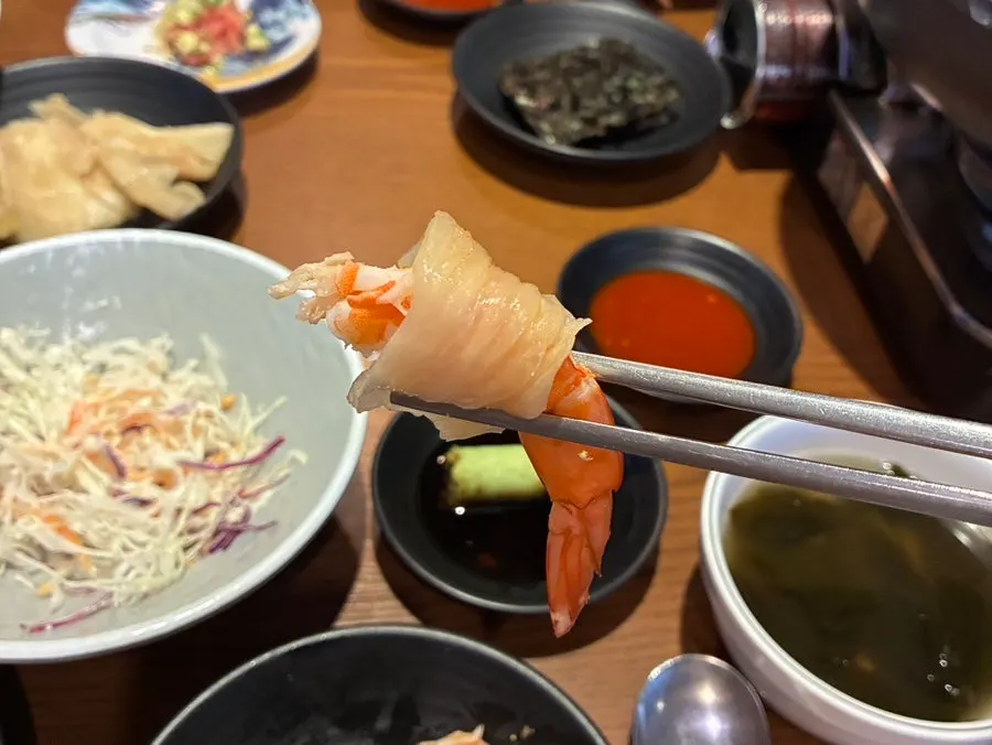 Grilled shrimp wrapped in aged kimchi