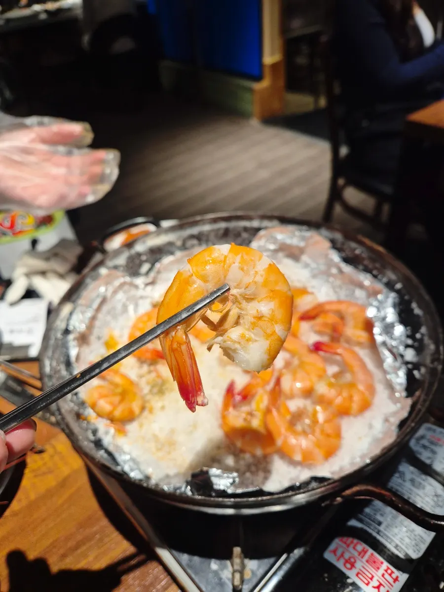 A platter of plump grilled shrimp