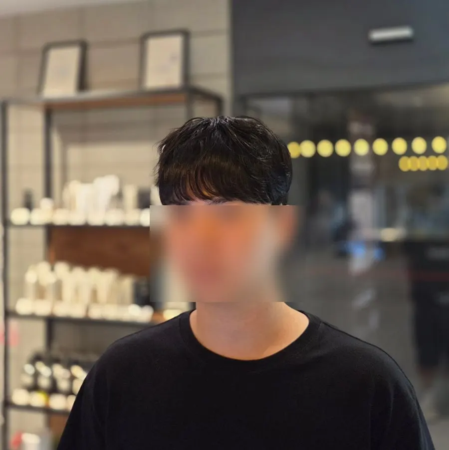 Side view of the finished men's hairstyle