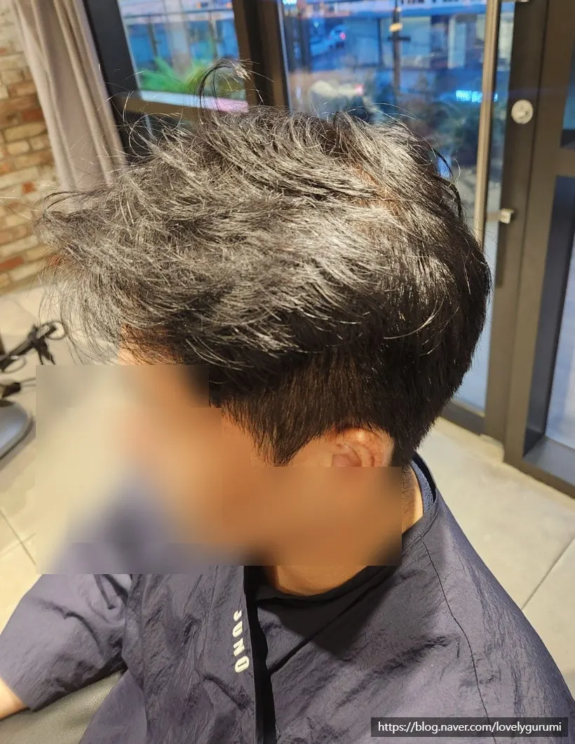Front view of shaggy hair before the service