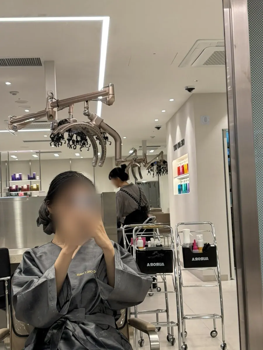 Getting a shampoo and scalp massage