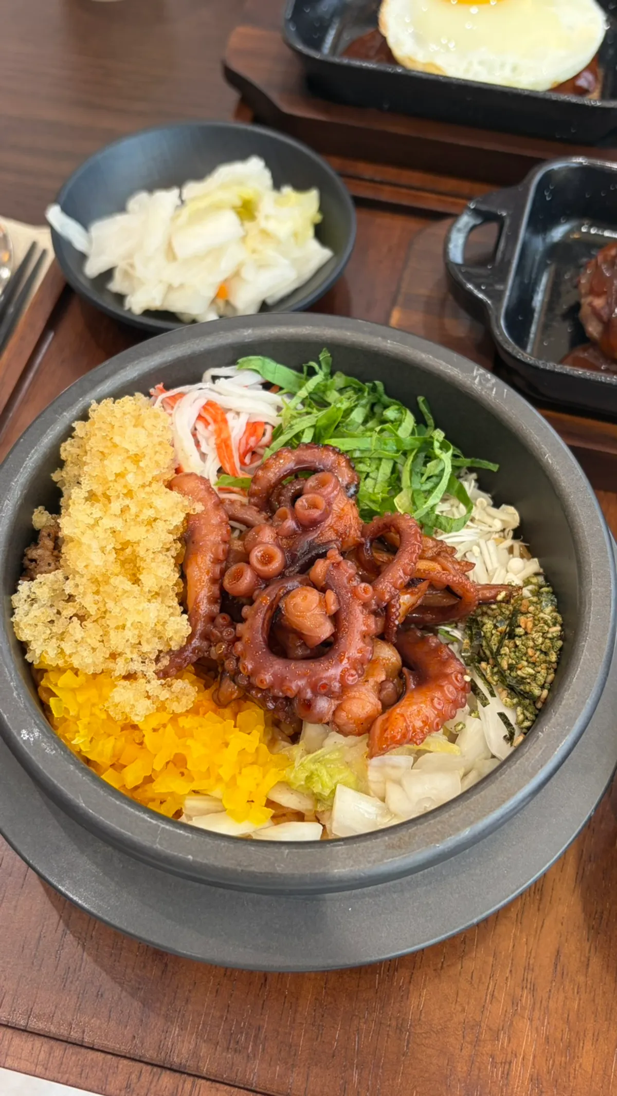 Hot stone octopus roe rice with octopus and flying-fish roe