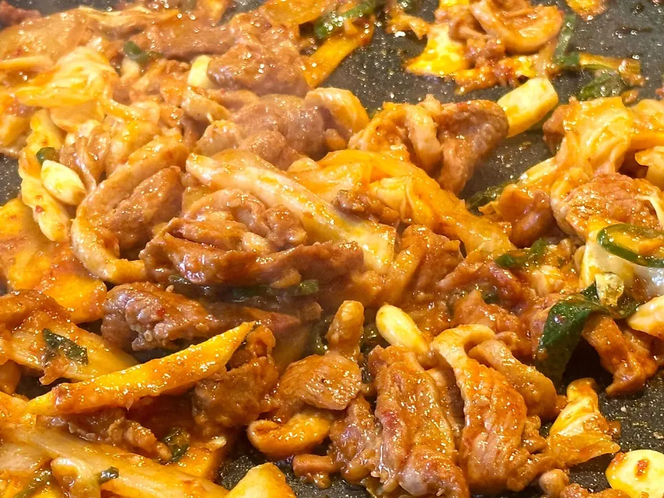 Spicy duck stir-fry cooked on the grill