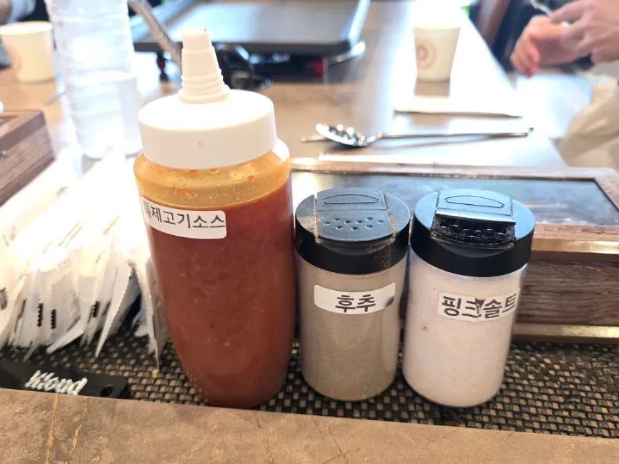 Self-serve bar with side dishes and vegetables