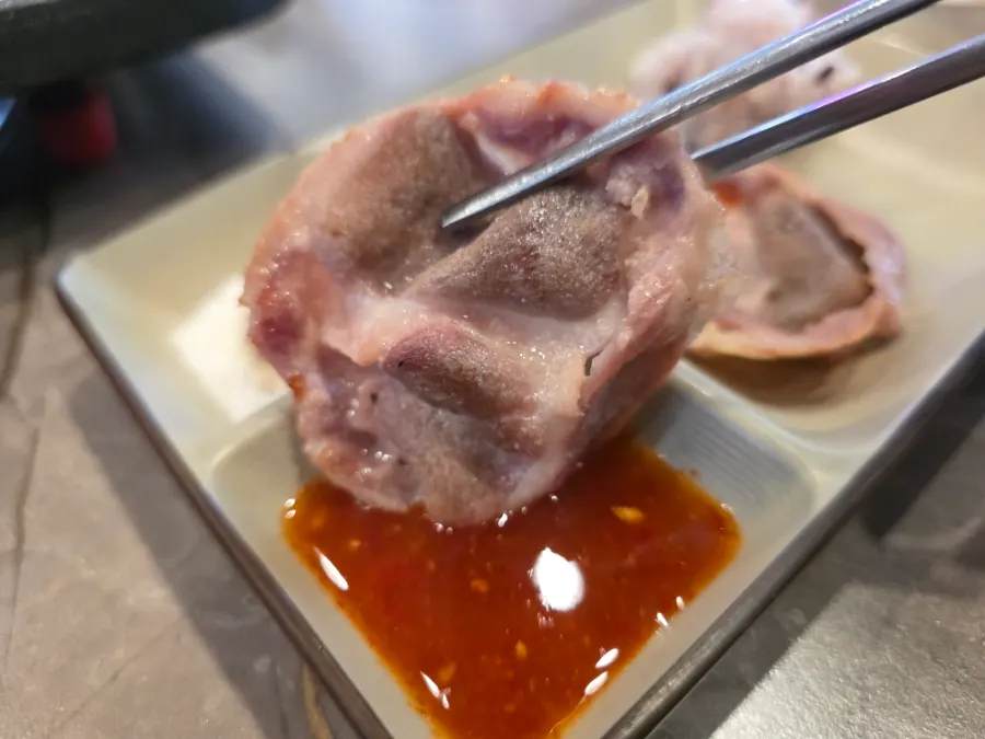 Duck chadol served with minari, onion, and mushroom
