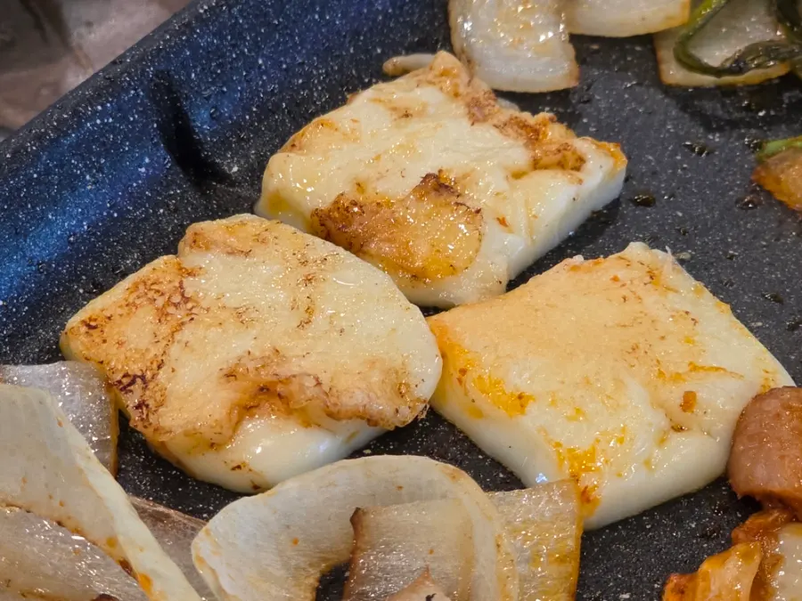 Cheese added to the duck stir-fry