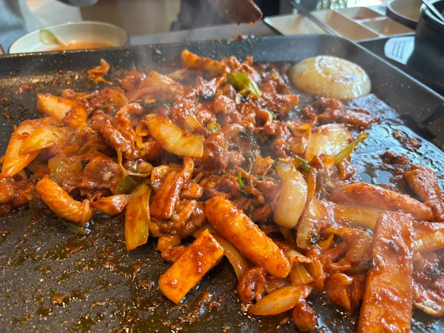 Raw duck jumulleok cooking together with sweet potato