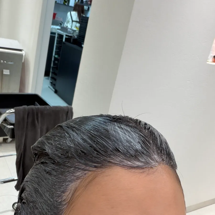 Reddish hair before the tone-down color