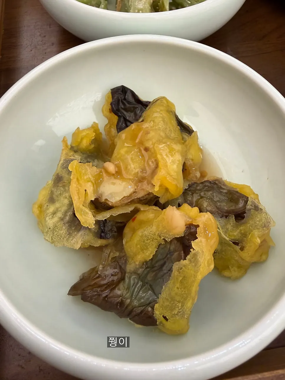 Basic banchan including seasoned scallop and gungchae namul