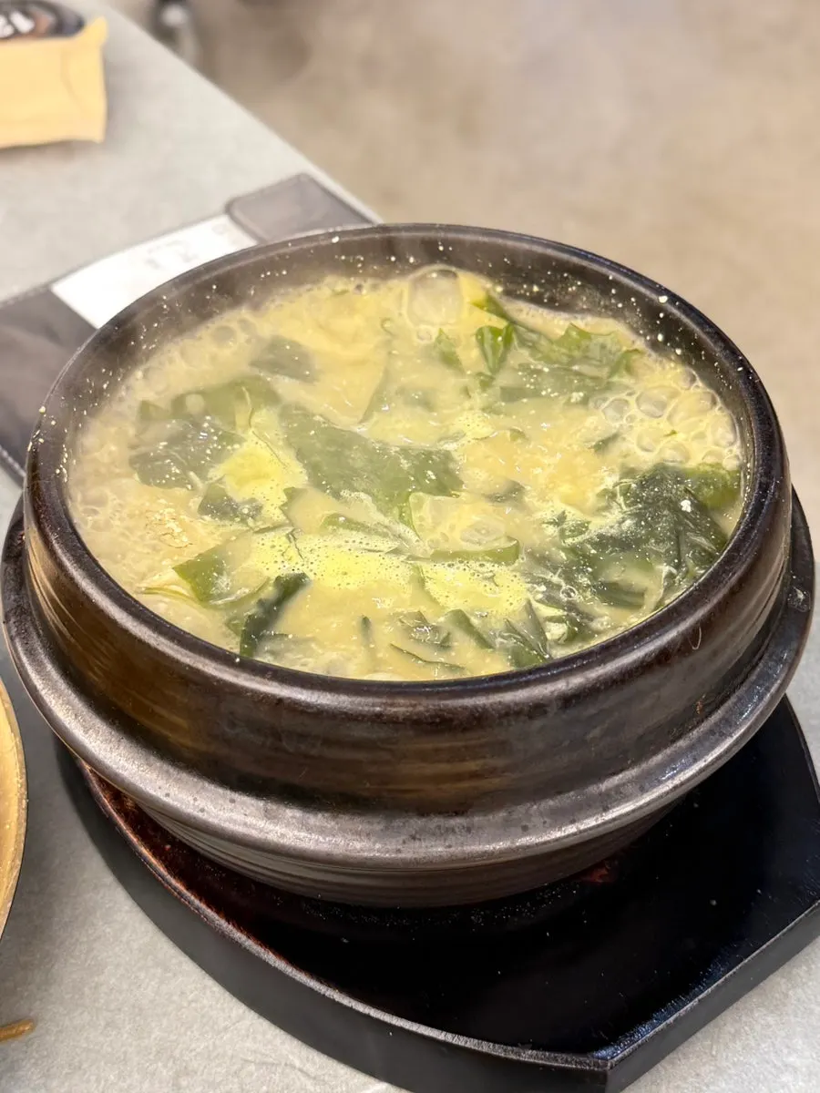 Flounder seaweed soup shared with a child