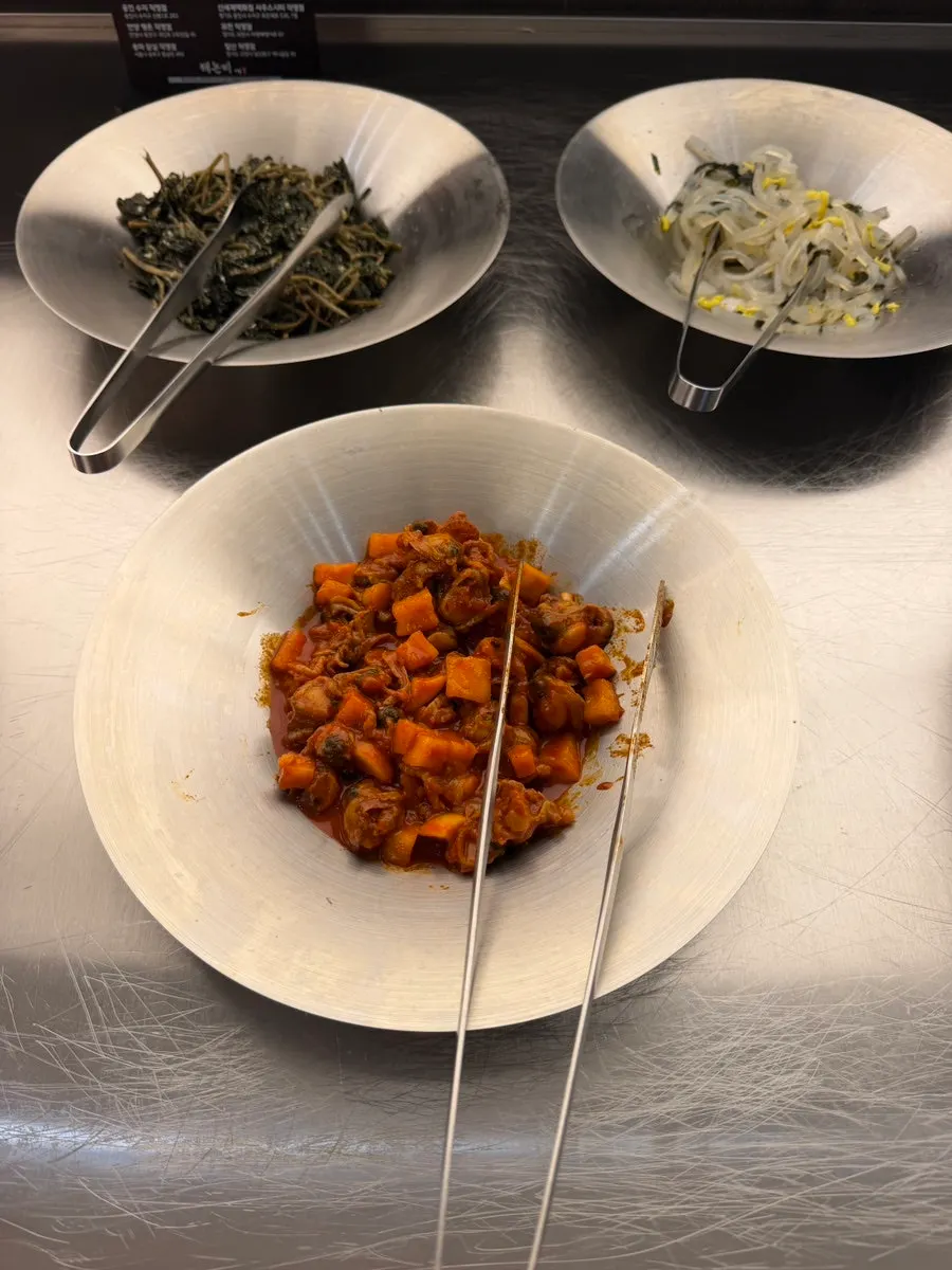 Plate of side dishes taken from the self-serve bar