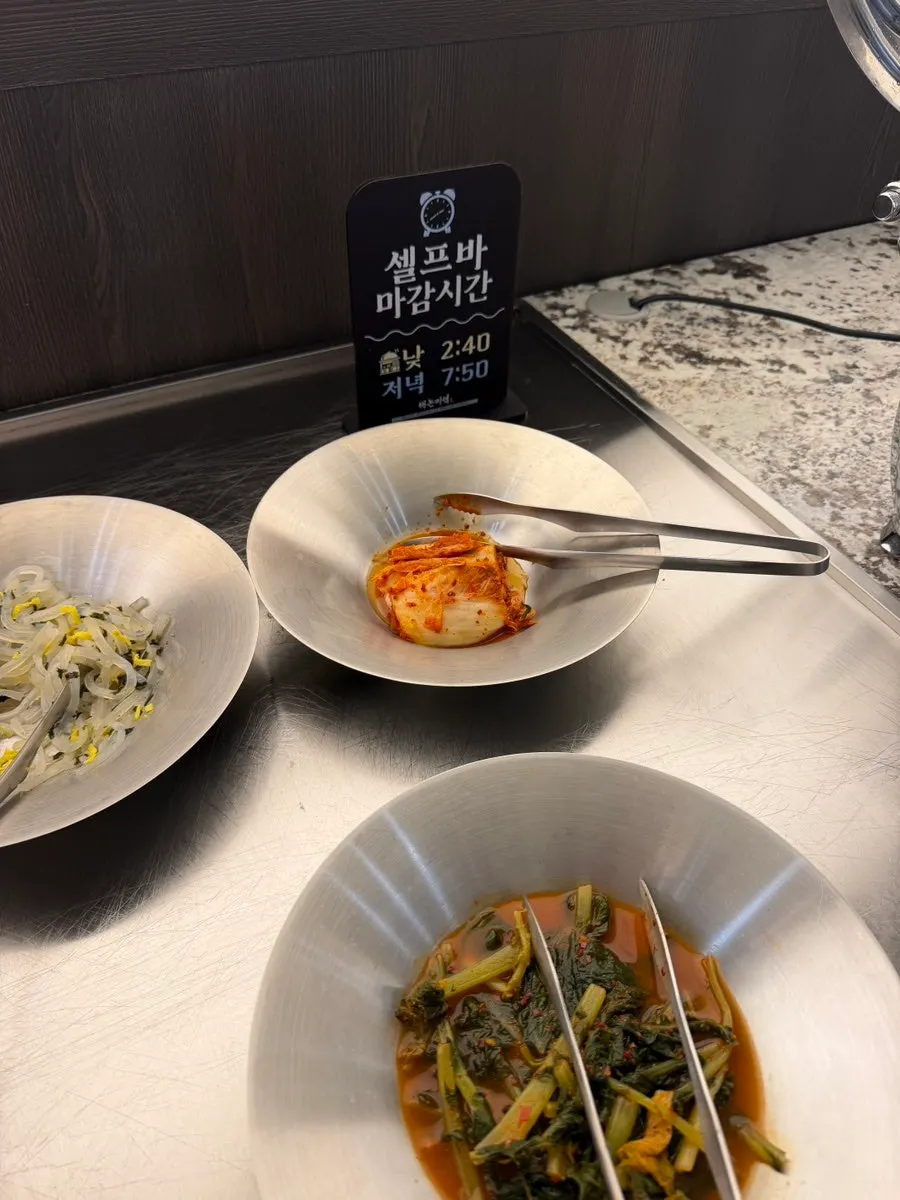 Serving side dishes from the self-serve bar