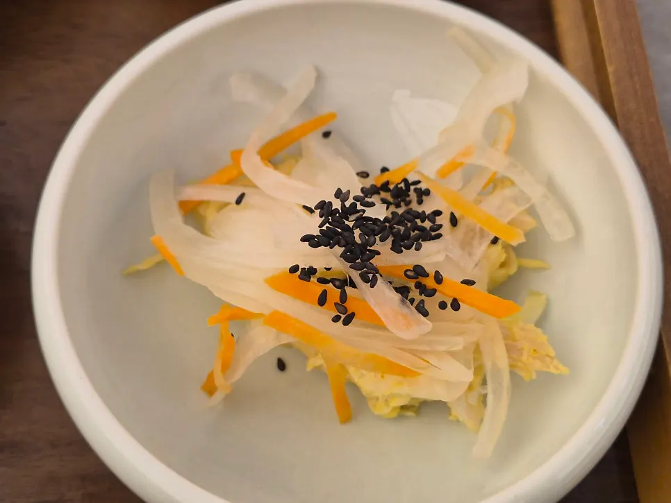 Close-up of side dish plates from the Haenon Miyeok set meal