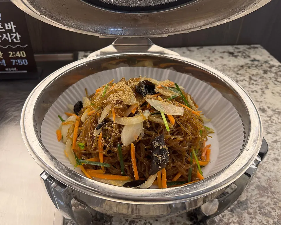 Japchae and namul at the self-serve bar