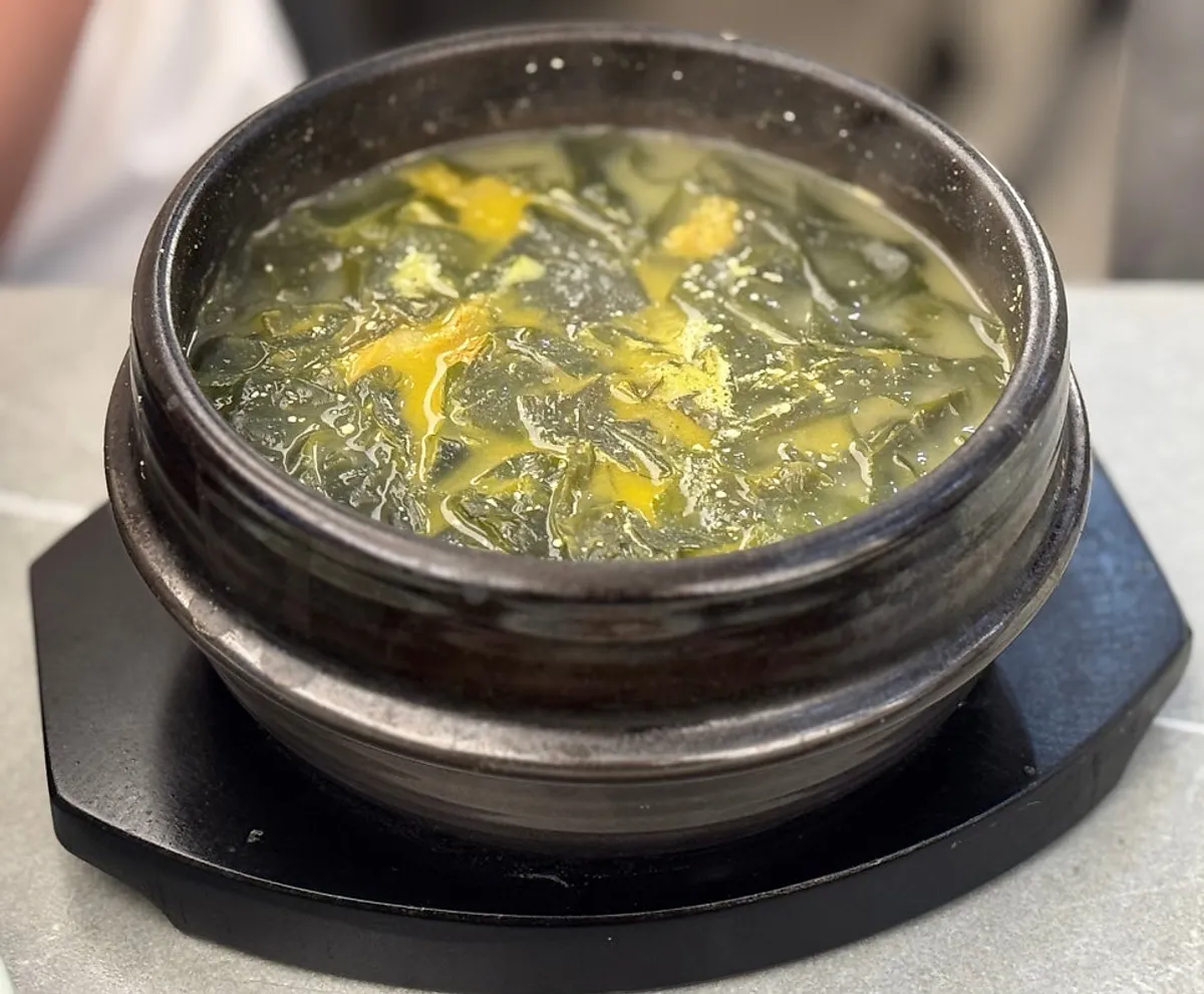 Dried pollack seaweed soup served in a stone bowl