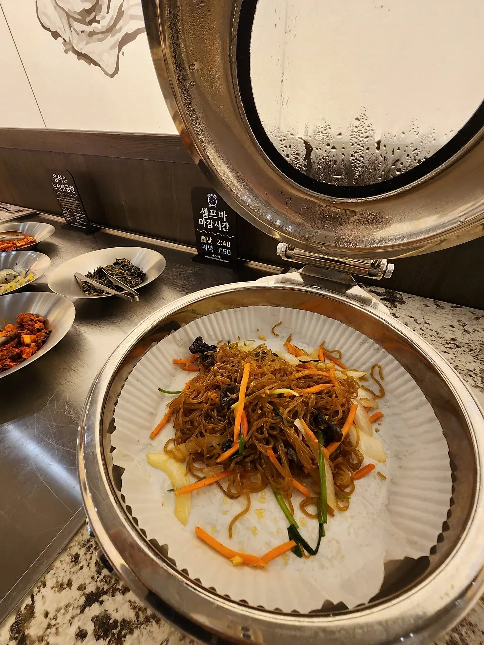 Neatly arranged side dishes at Haenon Miyeok