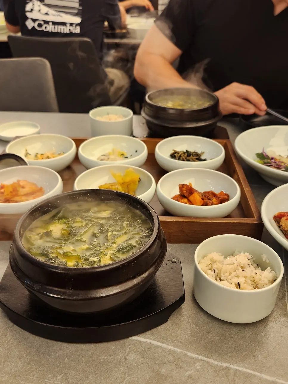 Steaming hot stone bowl of seaweed soup