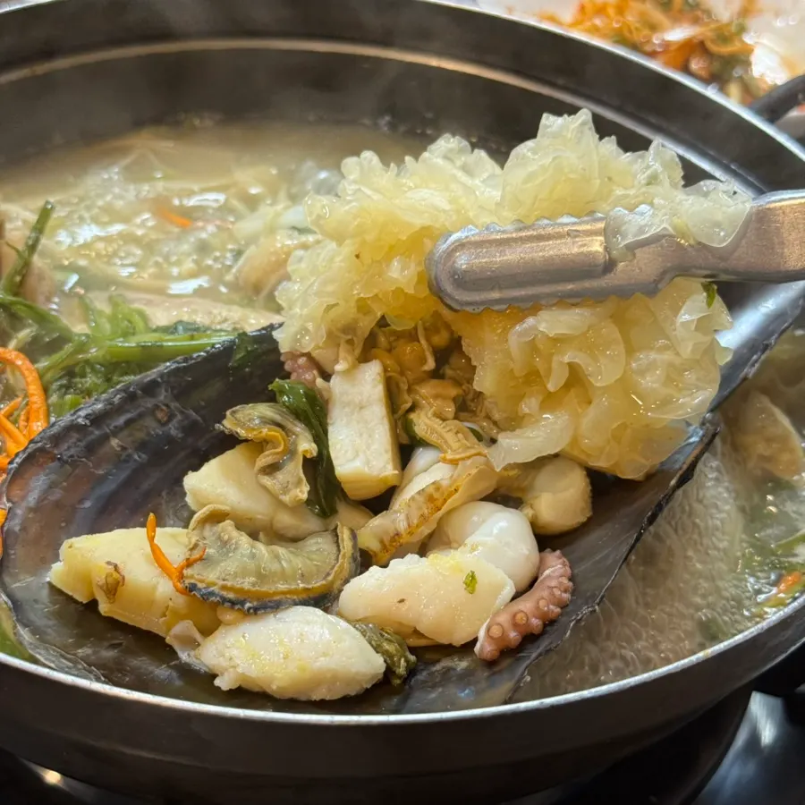 Plate of cooked seafood from the hot pot