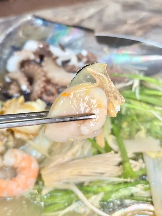 A piece of sliced, cleaned abalone
