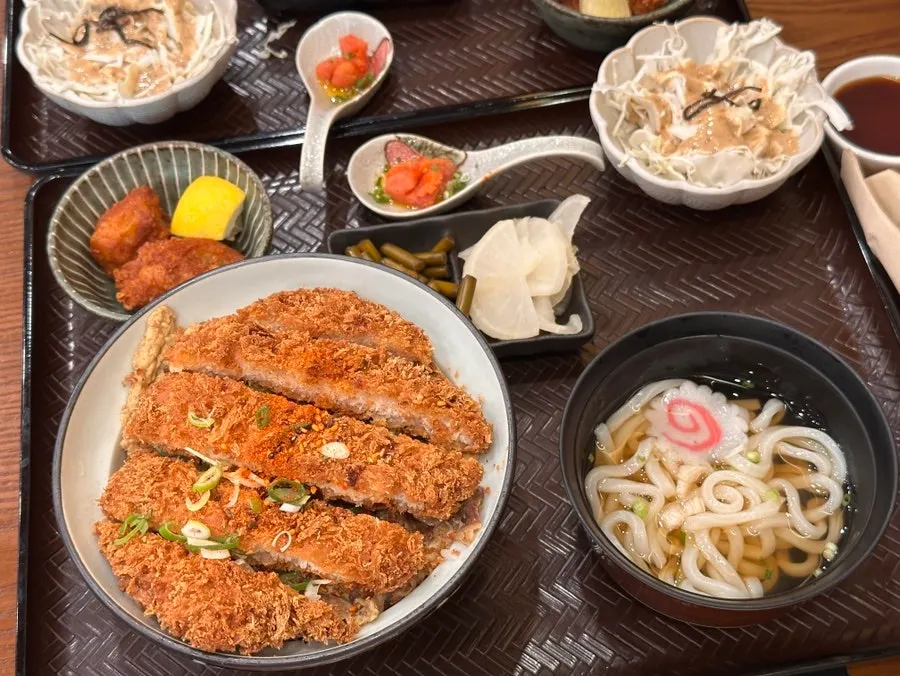 Katsu-don set topped with pork cutlet