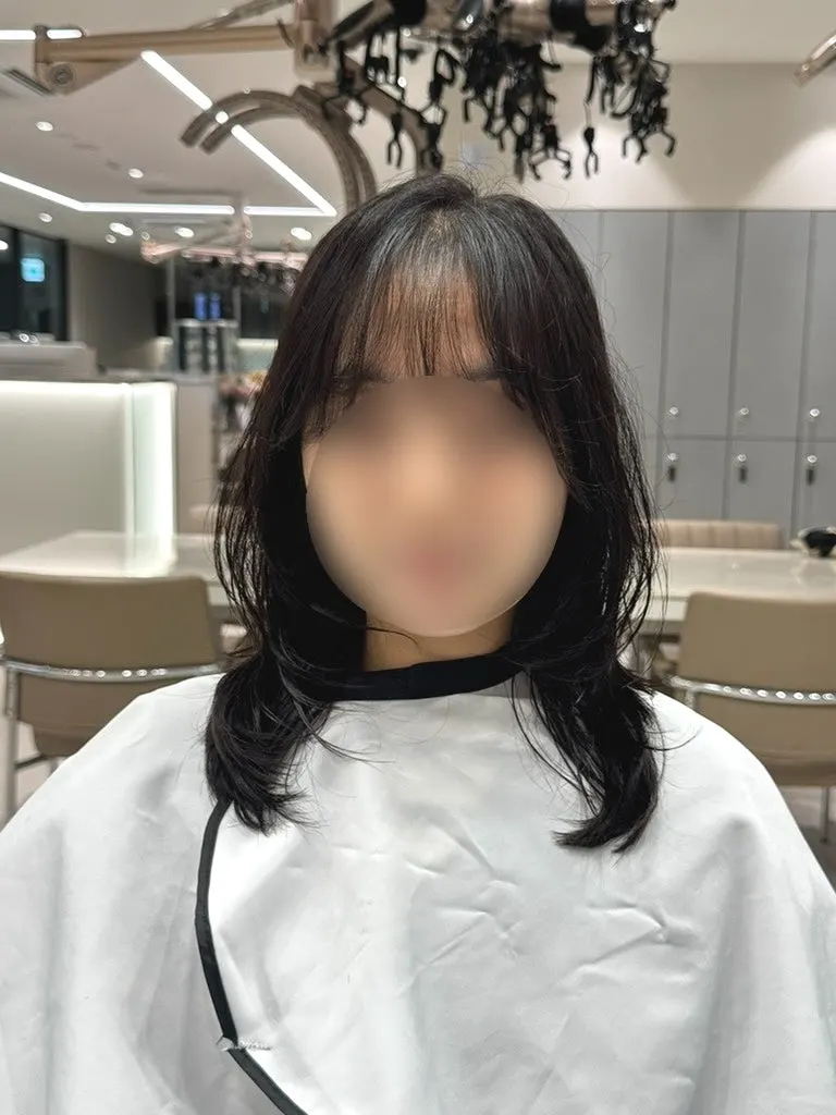 Finished style with root volume and C-curls