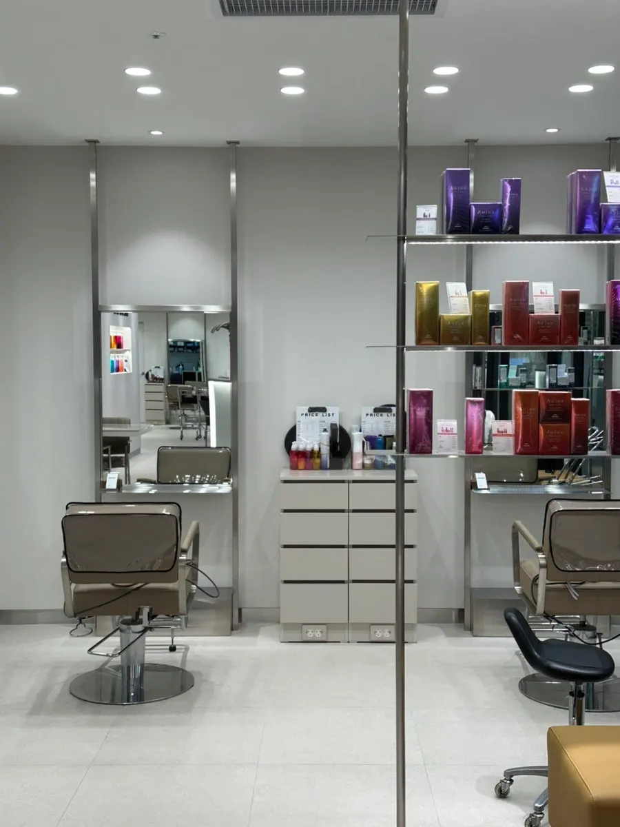 Interior of the salon with mirrors and styling chairs