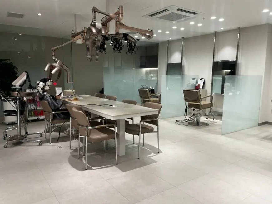 Entrance area with reception station and waiting sofa
