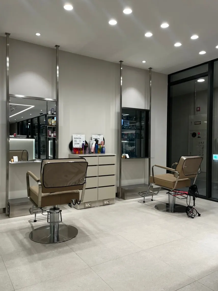 Salon interior with services underway on a weekday evening