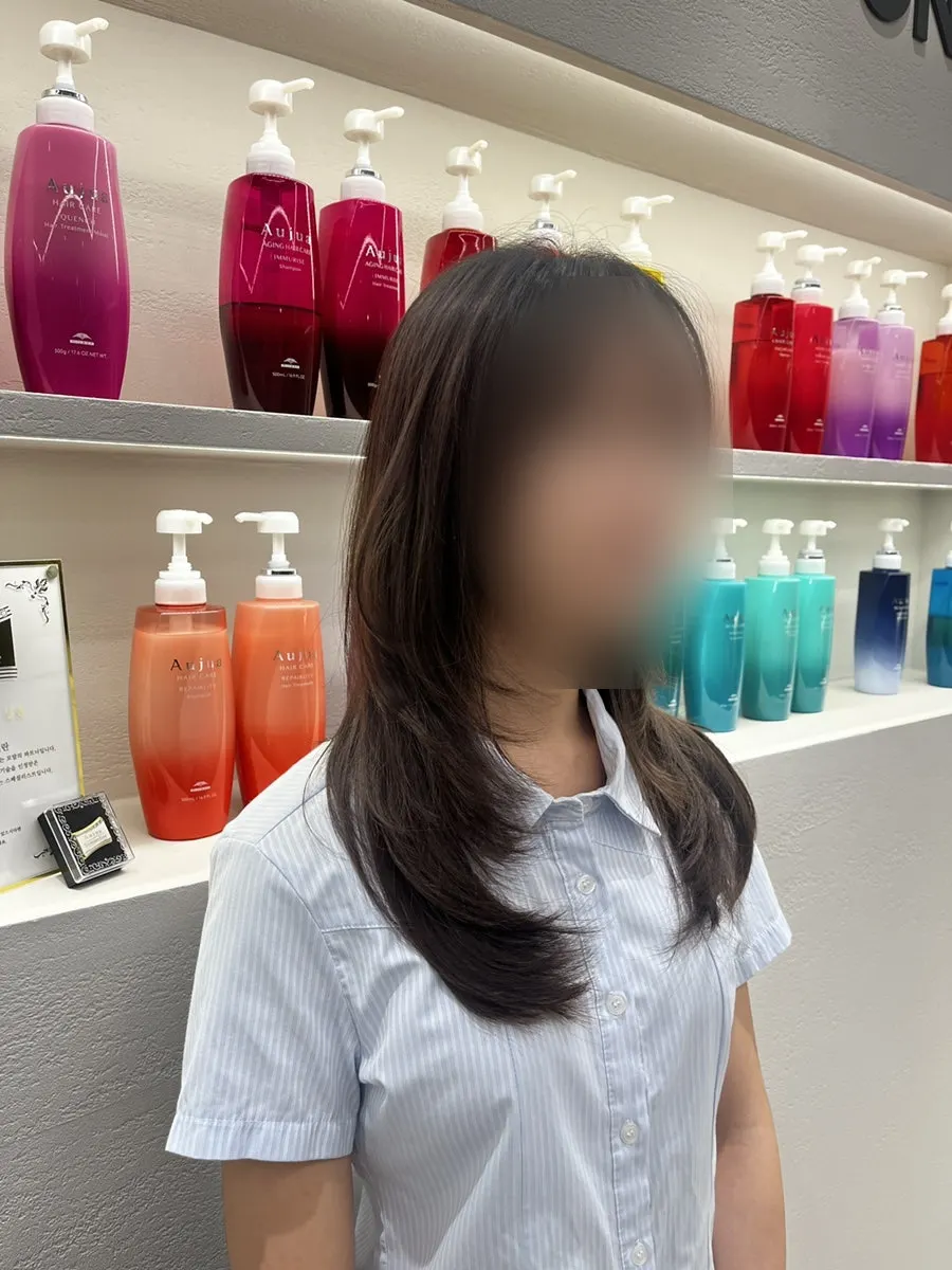 Side view of the layered cut with the back left long