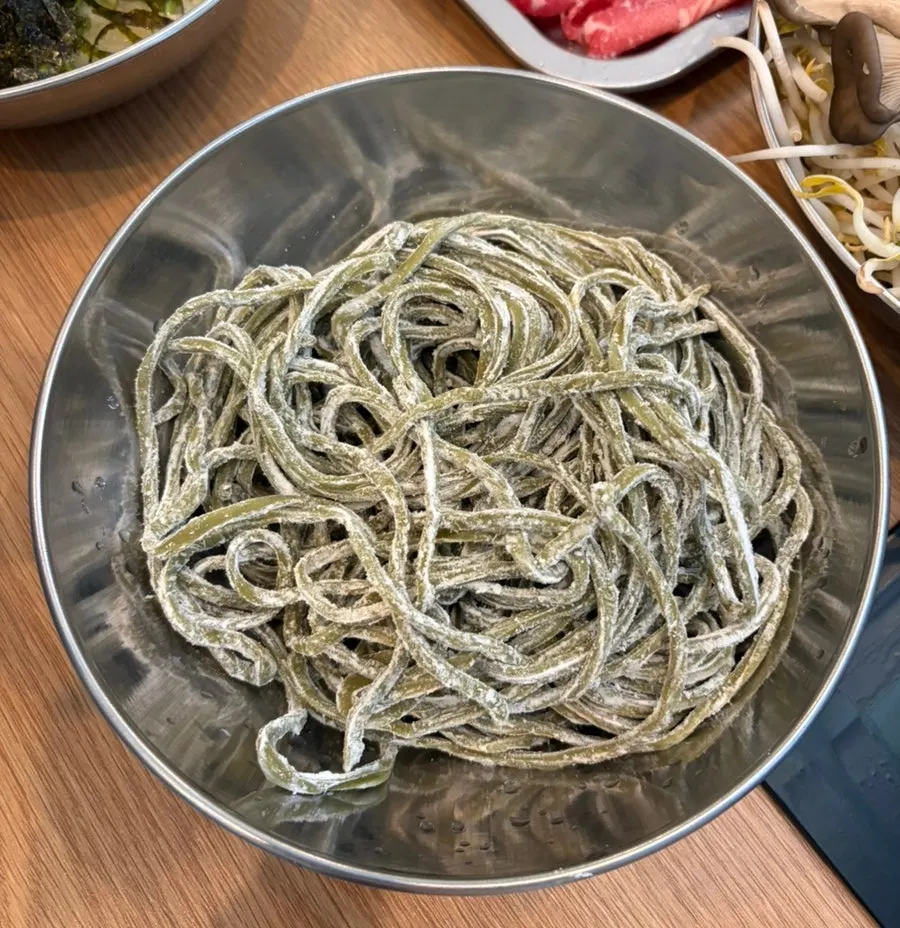 Kalguksu noodles included with the hot pot