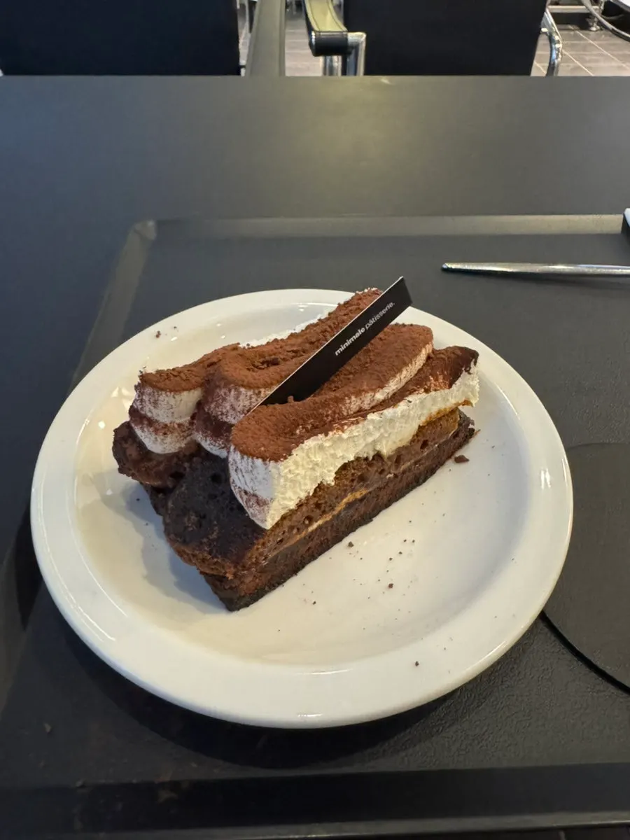 Savoiardi Tiramisu topped with cocoa powder