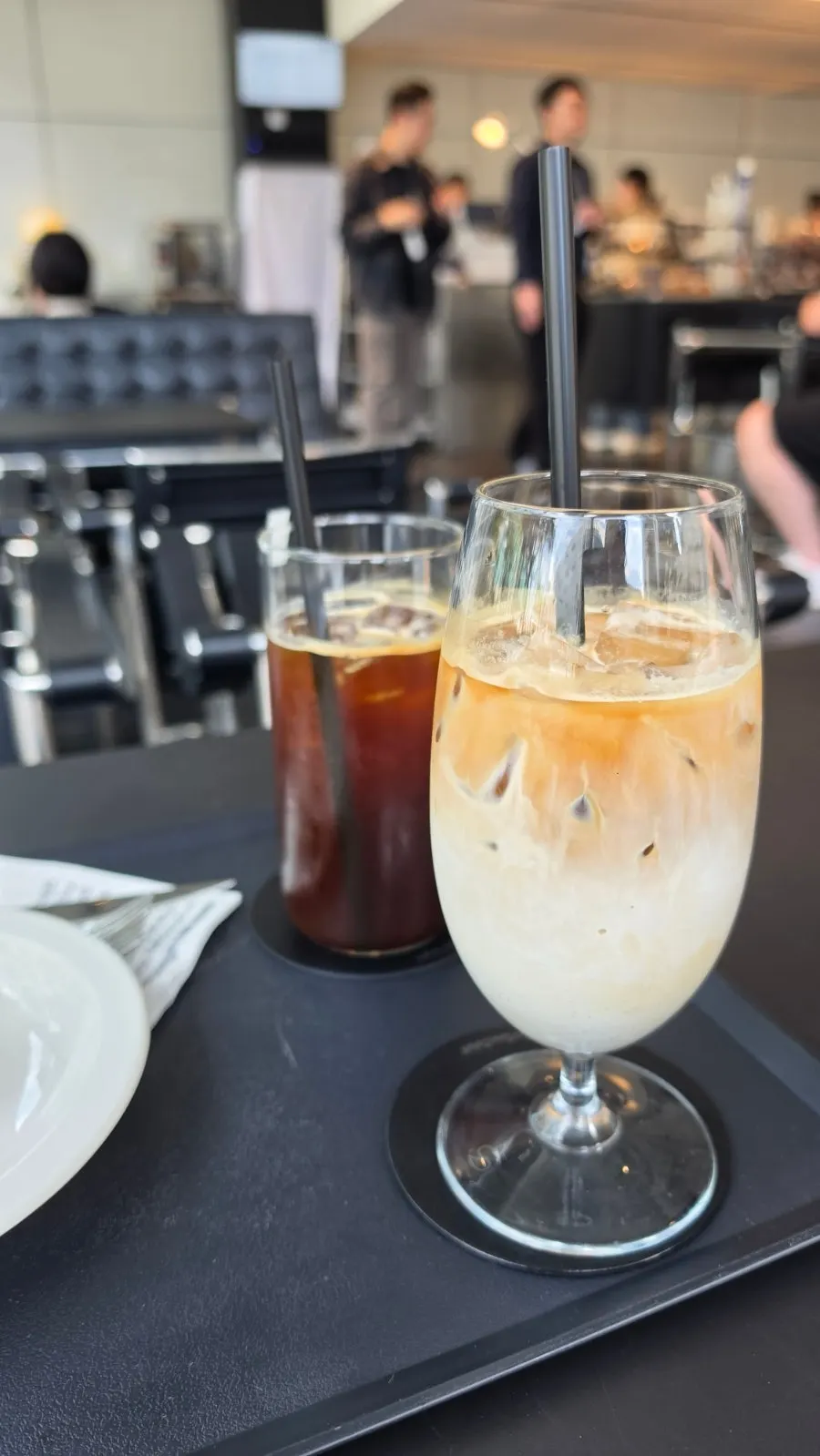 Iced Helsinki Latte with layered coffee and milk