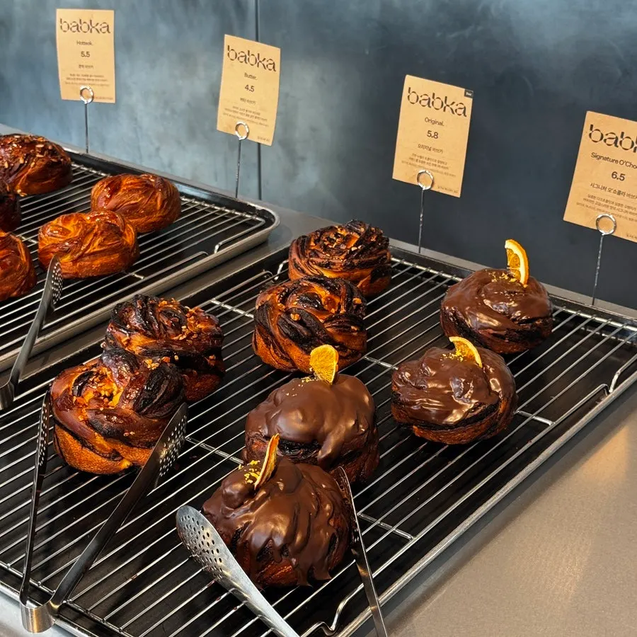 Various breads and desserts on display