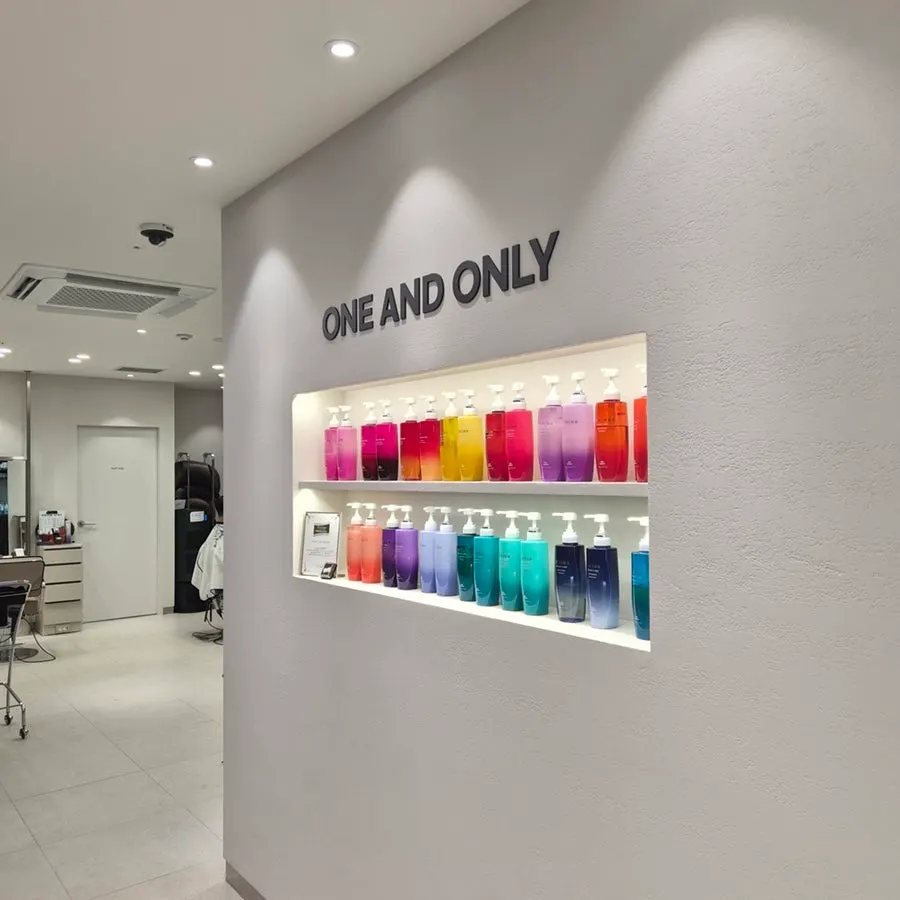 Sign and information for One & Only Hair Gwacheon Government Complex Station