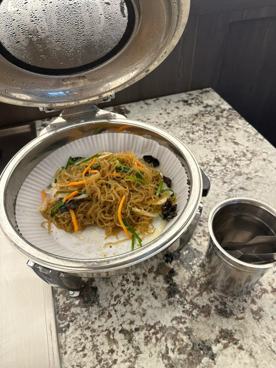 Neatly arranged side dishes at the self-serve bar