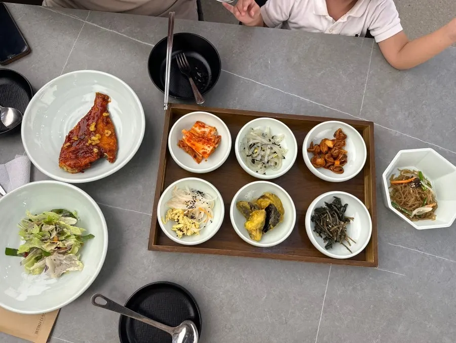 Full table of banchan served with the set meal