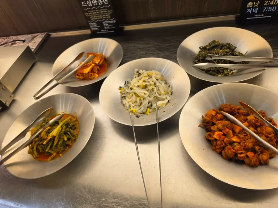 Self-serve banchan bar corner at Haenon Miyeok