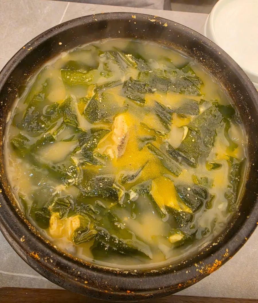 Full spread of a seaweed soup set meal