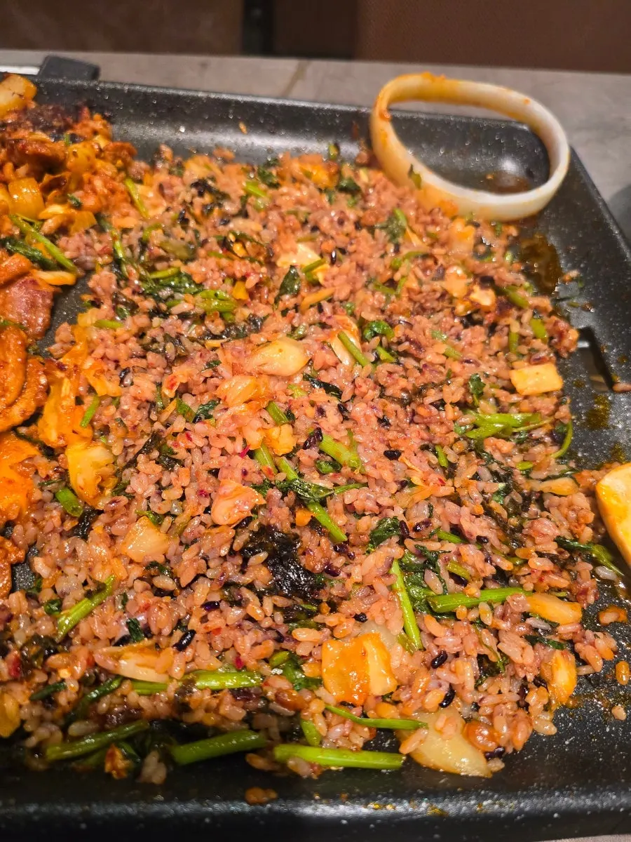 Crispy rice crust stuck to the grill
