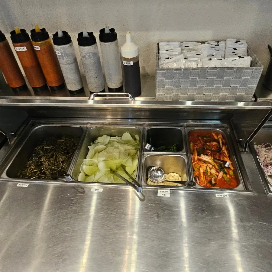 Japchae and cucumber salad among the side dishes