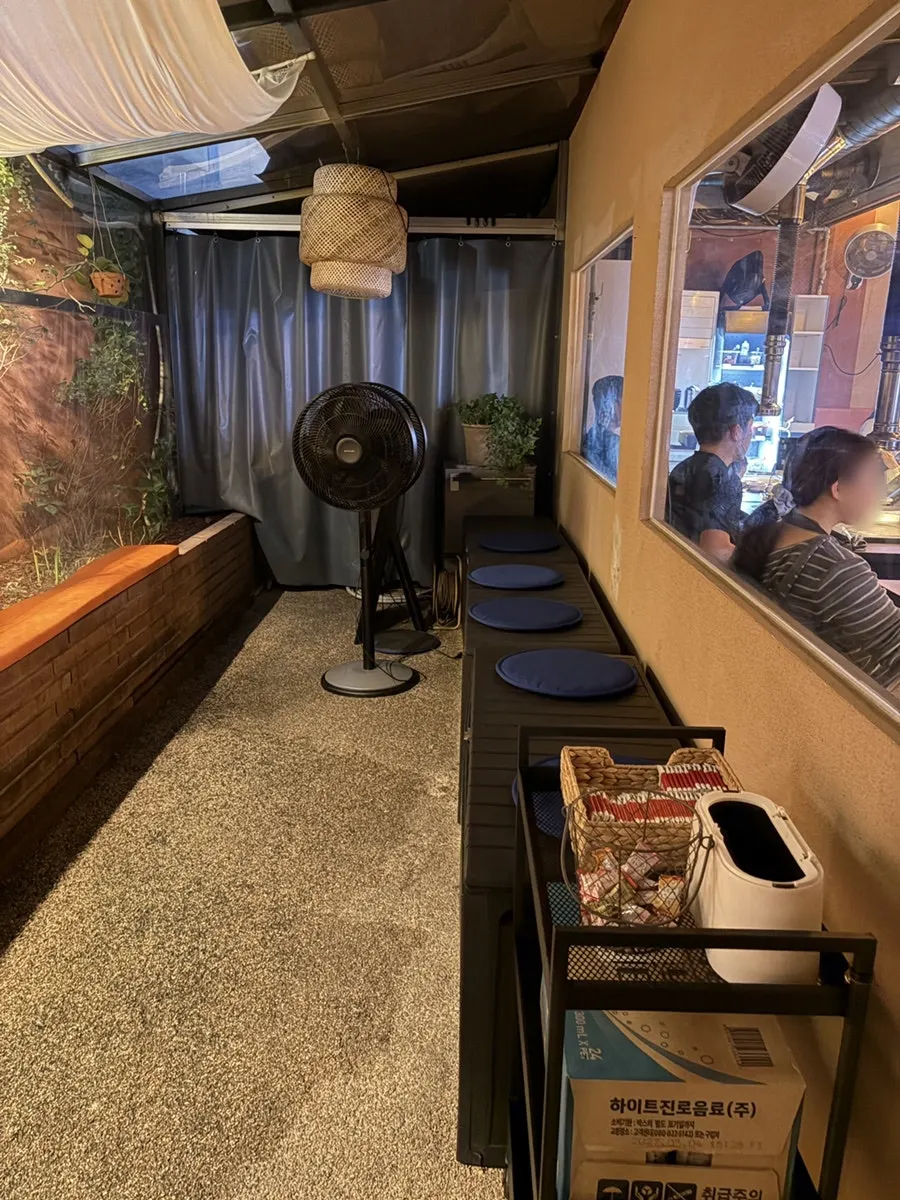 Indoor seating and walkway at Gwangan-mok Gwangan Branch