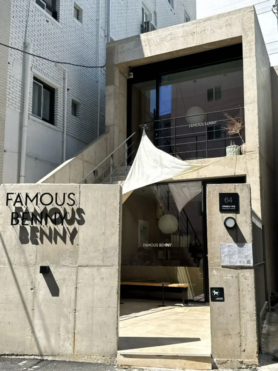 Vertical exterior shot of the brunch café tucked in a Gwangalli alley