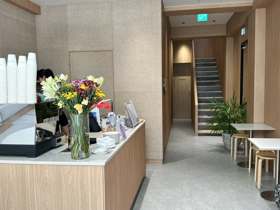 Interior of Famous Benny decorated mainly with wood tones