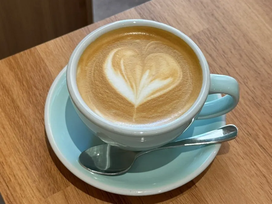 Café latte topped with a heart latte art